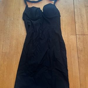 Spooky large black woman’s body con dress scalloped neckline